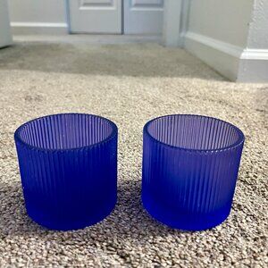 Set of two royal blue glass candle holders